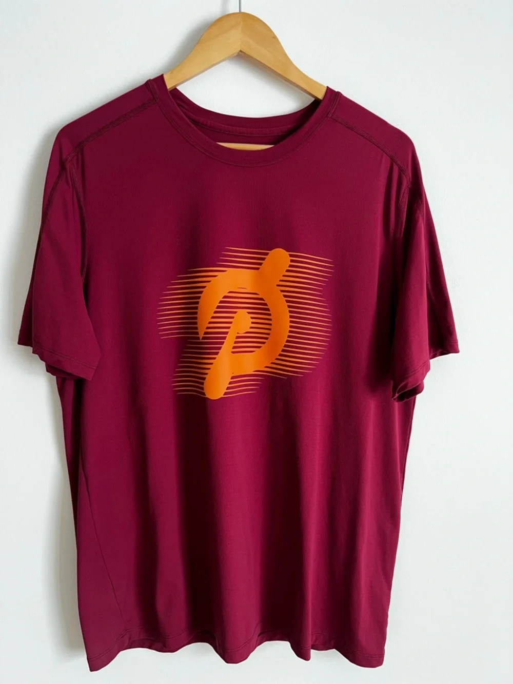 Peloton Maroon Short Sleeve Dry Fit Tee with Orange Logo-Size Medium - Picture 1 of 7